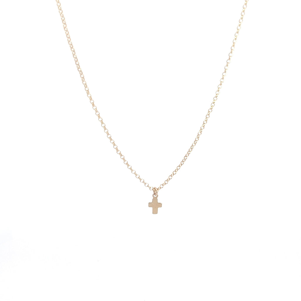 Tiny gold hot sale cross charm